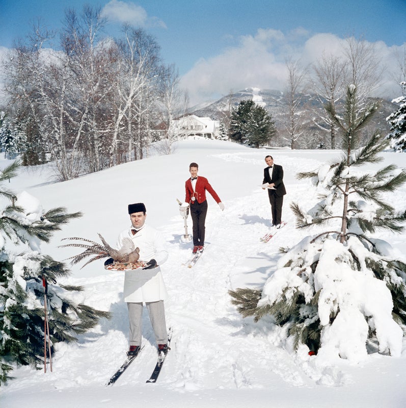 Skiing Waiters (Vermont), 1962 by Slim Aarons