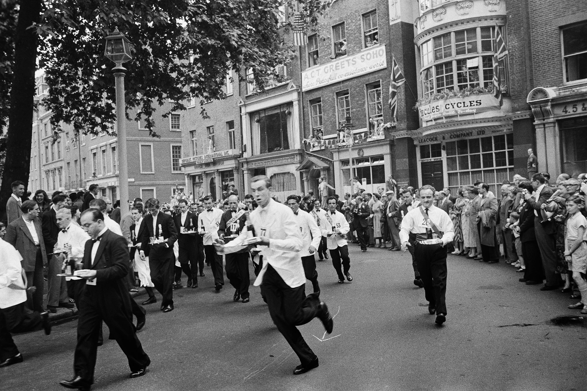 Soho Waiters' Race (London), 1955 by Slim Aarons