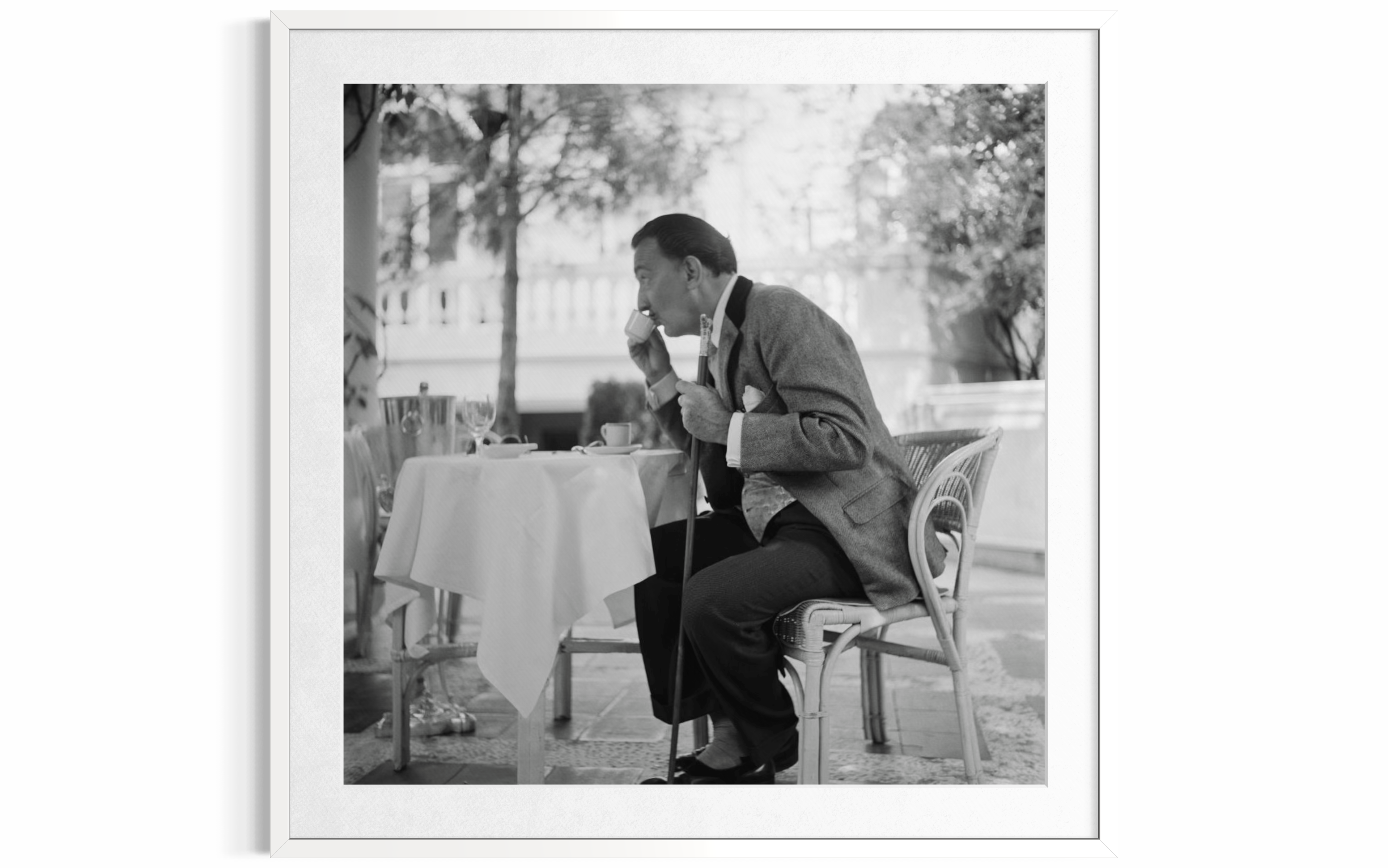 Coffee With Dali (Ritz Hotel, Madrid), 1955 by Slim Aarons