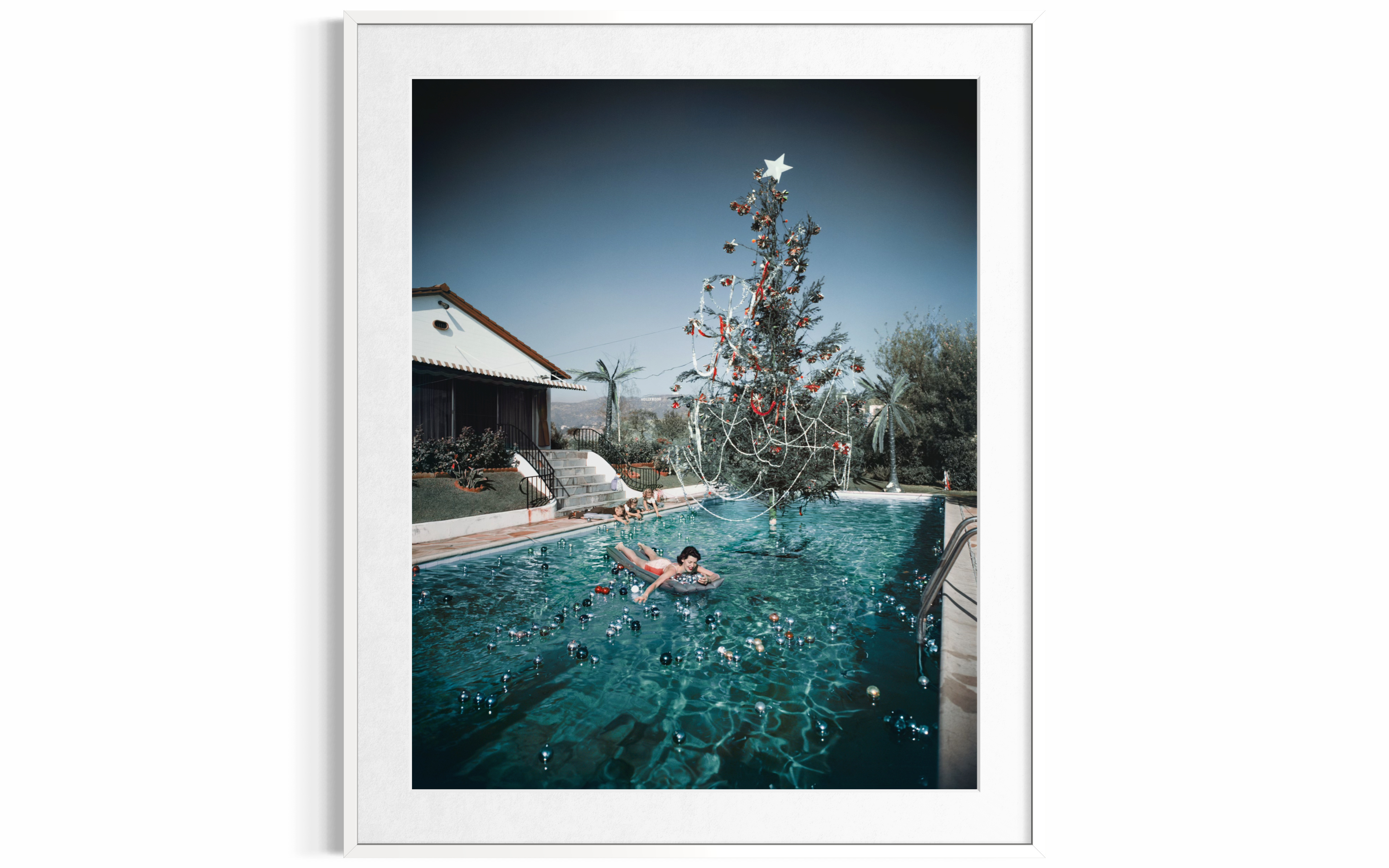 Christmas Swim (Hollywood), 1954 by Slim Aarons