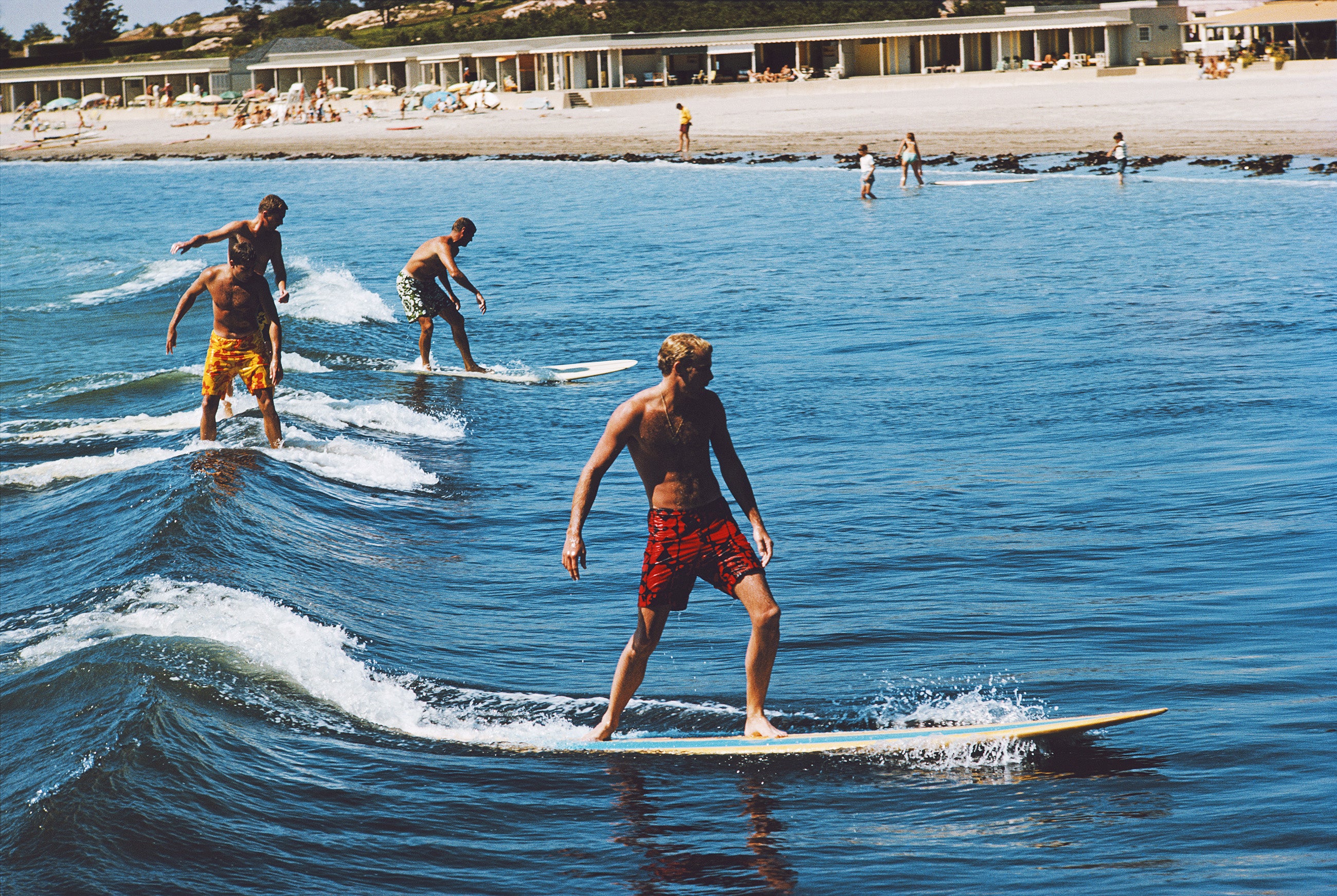 Surfing Brothers (Newport), 1965 by Slim Aarons
