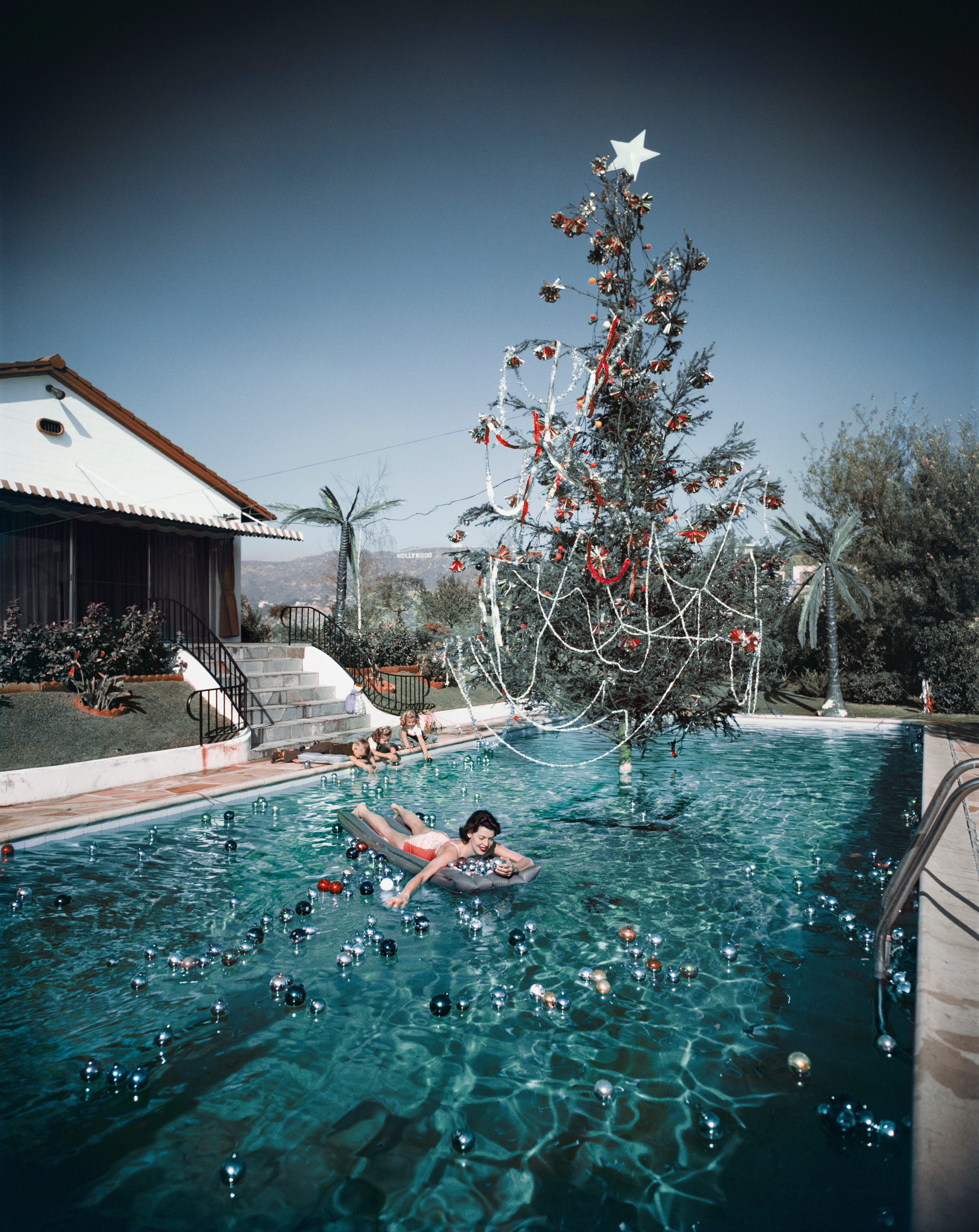 Christmas Swim (Hollywood), 1954 by Slim Aarons