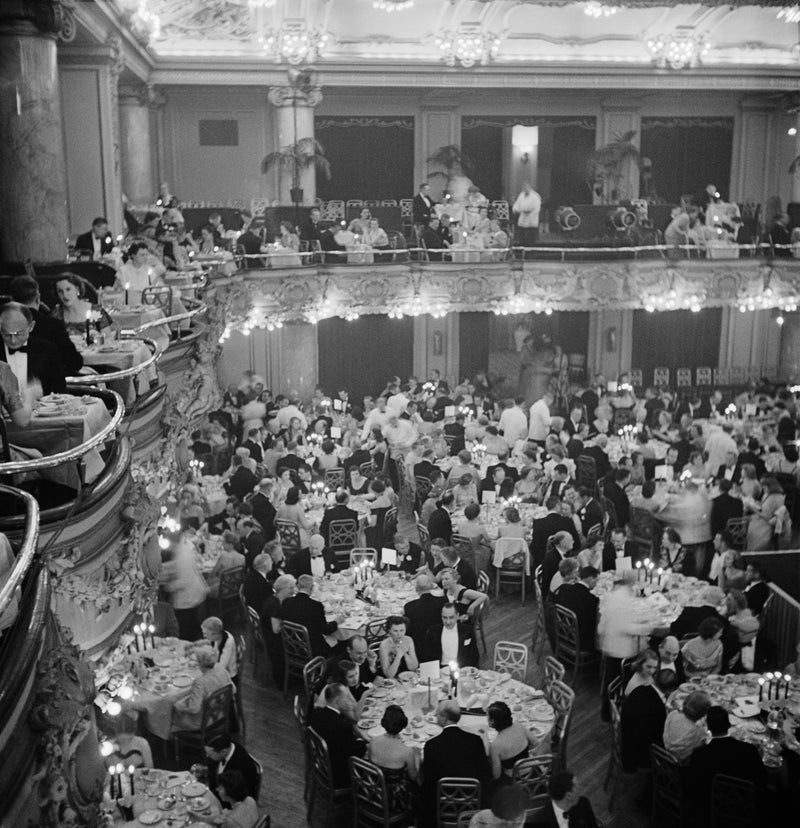 Luxury Dining (Fashion Show), 1955 by Slim Aarons