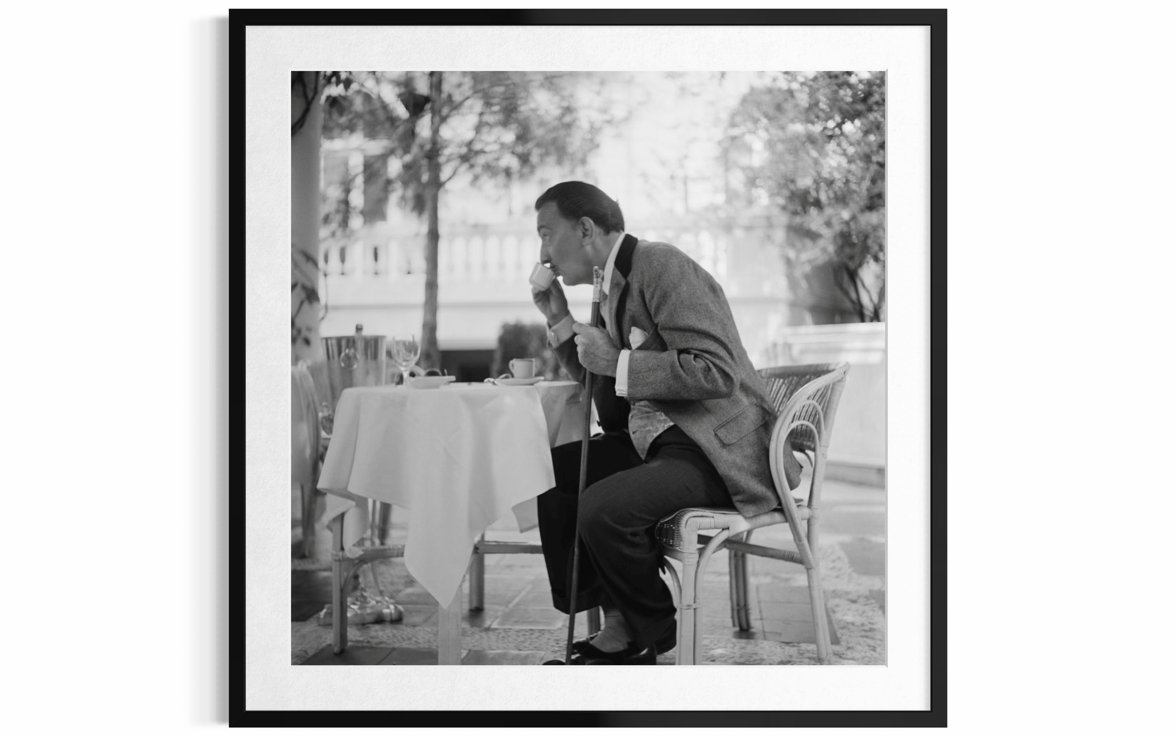 Coffee With Dali (Ritz Hotel, Madrid), 1955 by Slim Aarons
