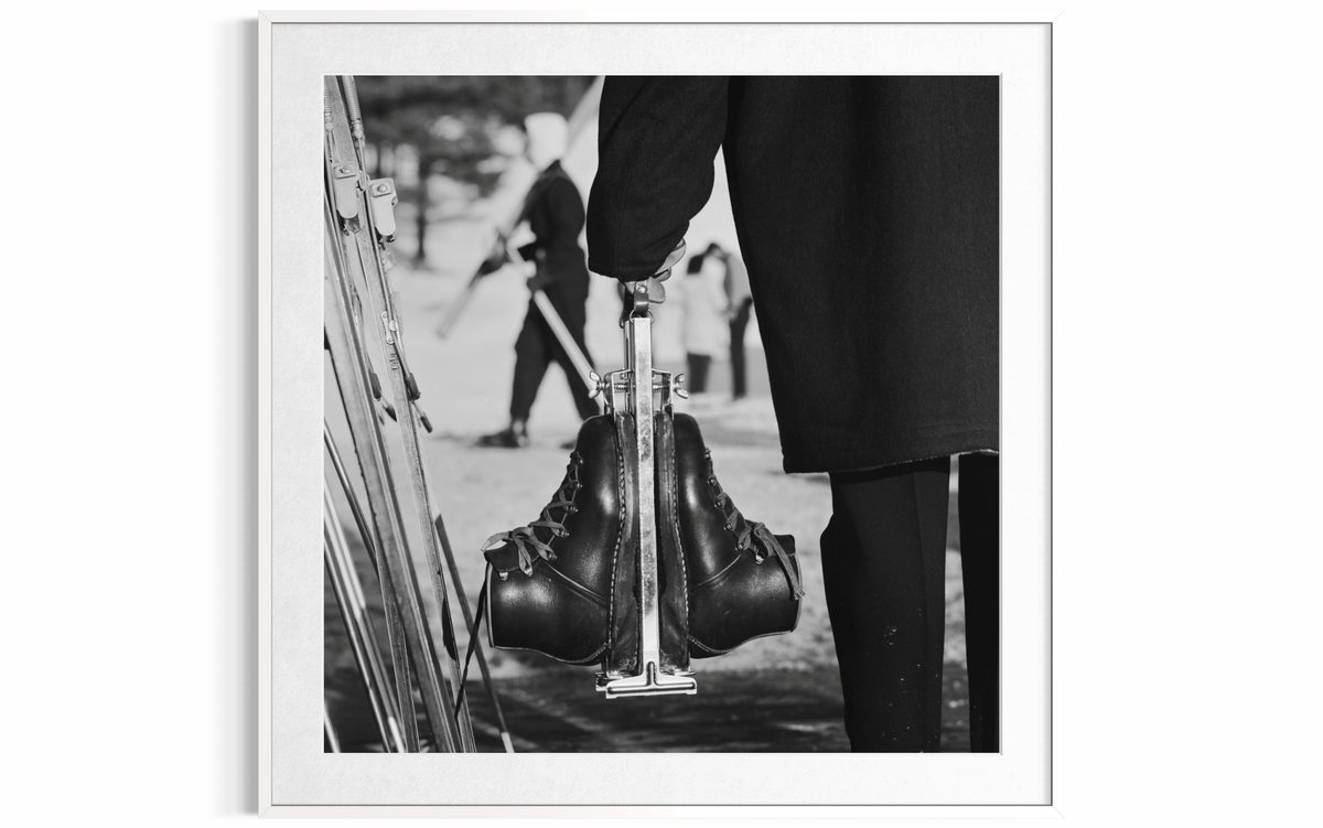 New England Skiing (Boots), 1955 by Slim Aarons
