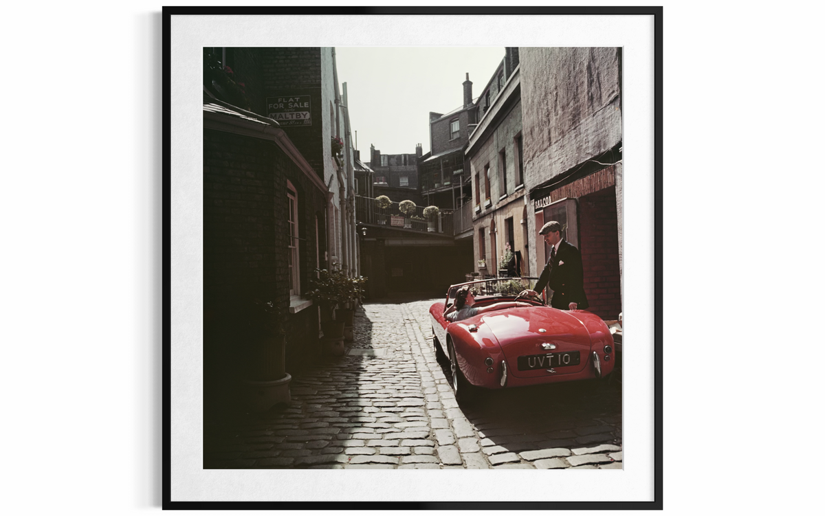 Sports Car Couple (London), 1955 by Slim Aarons