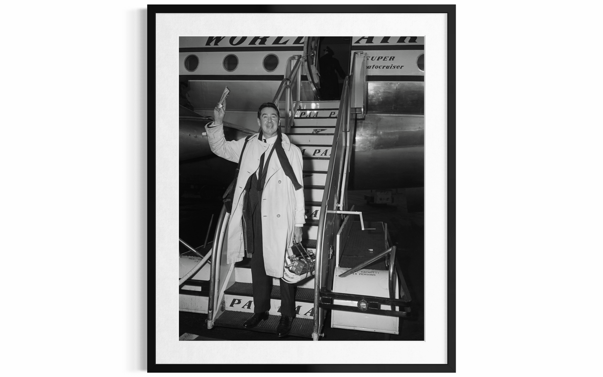 Slim Arrives (Pan Am Airlines), 1955 by Slim Aarons